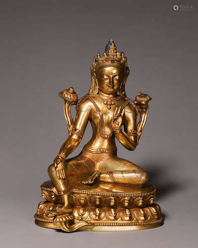 A gilding copper buddha statue