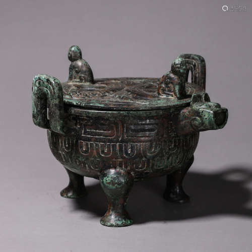 A dragon patterned bronze pot