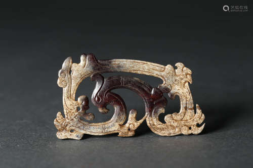A Carved Brownish Jade Dragon Pendant