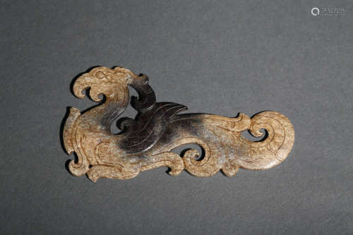 A Carved Brownish Jade Phoenix Pendant