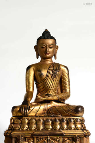 A Gilt Bronze Statue Of Shakyamuni