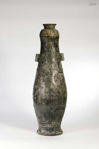 A Bronze Vase And Cover