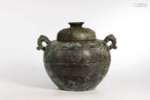 A Bronze Double Eared Globular Jar And Cover