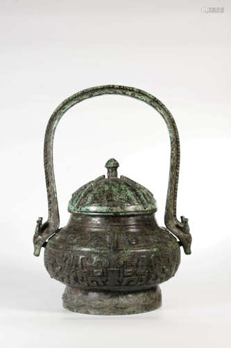 A Bronze Loop Handle Vessel