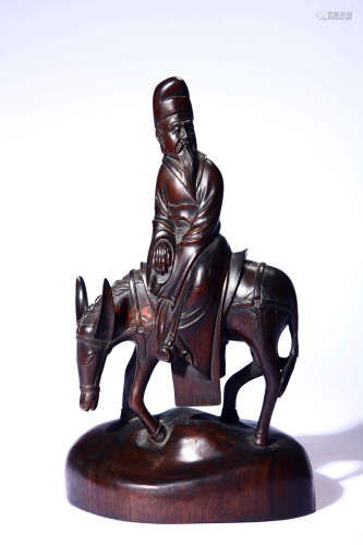 A Carved Bamboo Figure And Donkey Ornament