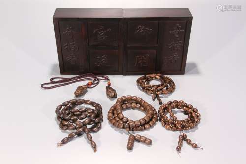 A Set of Six Eaglewood Bracelets and Pendants
