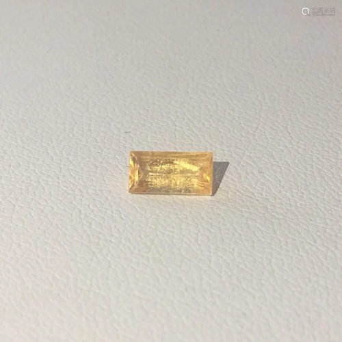 0.87 CT Baguette cut yellow sapphire.