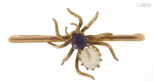 Unmarked gold spider bar brooch set with...