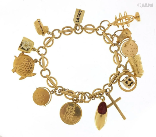 9ct gold charm bracelet with a selection...