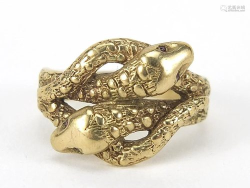 9ct gold serpent ring with ruby eyes, st...