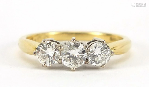 18ct gold diamond three stone ring, the ...