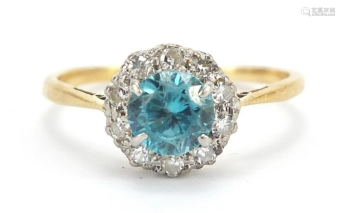 Unmarked gold blue stone and diamond rin...