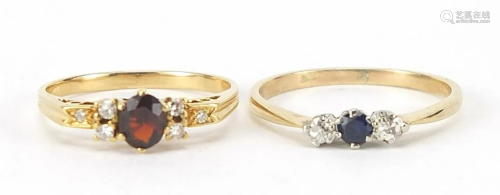 Two unmarked gold rings set with diamond...