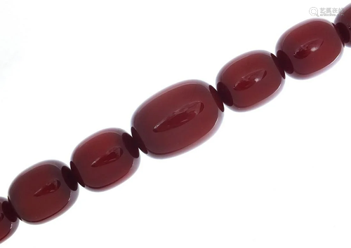 Very large cherry amber coloured bead ne...