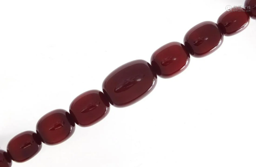 Very large cherry amber coloured bead ne...