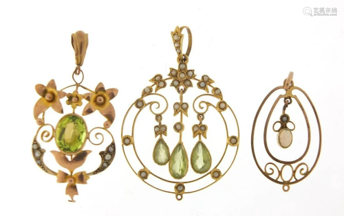 Three Art Nouveau gold pendants set with...