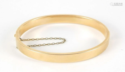 15ct gold hinged bangle, 6.5cm wide, 10....