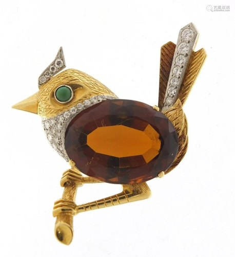 Good unmarked gold and citrine bird on a...