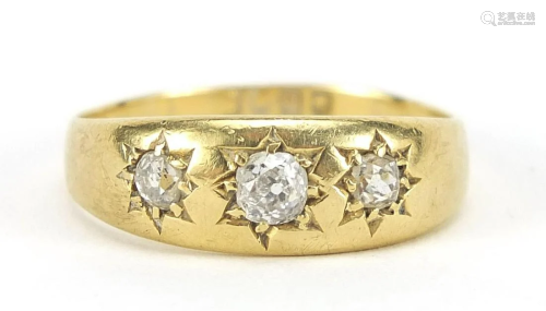 8ct gold diamond three stone Gypsy ring...