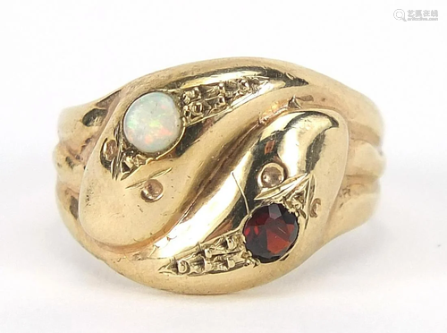 9ct gold serpent ring set with a garnet ...