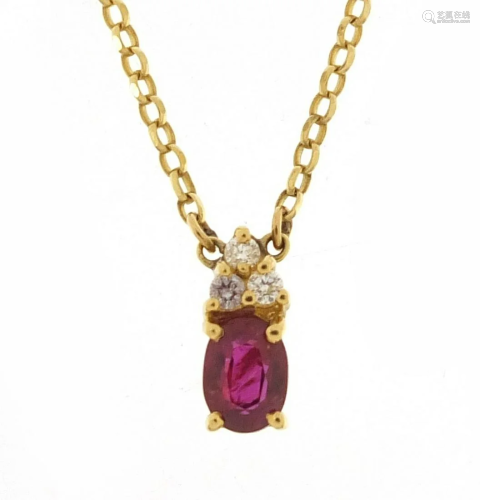 18ct gold ruby and diamond pendant on an...
