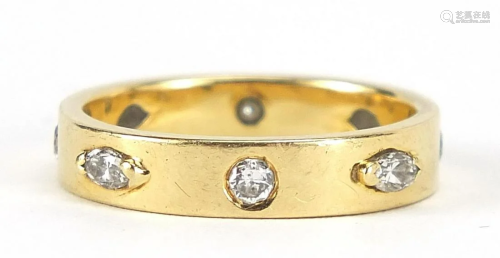 Unmarked gold diamond eternity ring, (te...