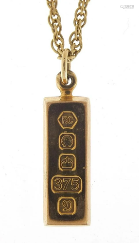 9ct gold ingot pendant on a 9ct gold nec...