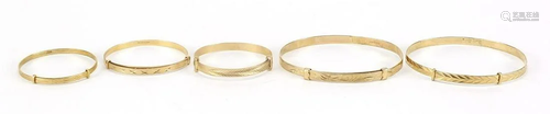 Five 9ct gold christening bracelets, the...