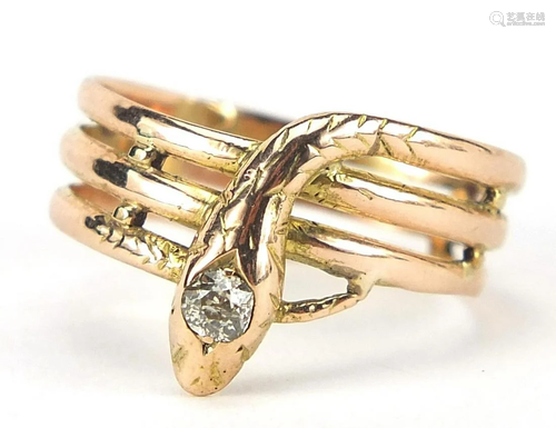 Unmarked gold serpent ring set with a di...