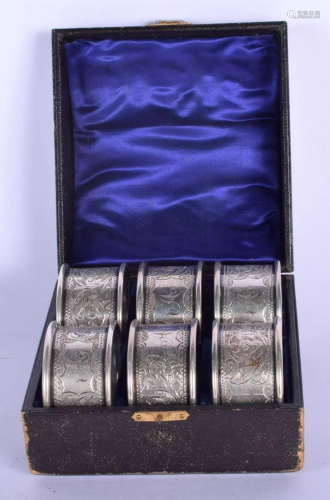 SIX CASED SILVER NAPKIN RINGS. Chester 1903. 162 grams.