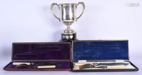 A VINTAGE SILVER TROPHY together with two plated