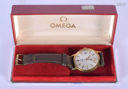 A BOXED GOLD PLATED OMEGA WRISTWATCH. 3.25 cm dia…