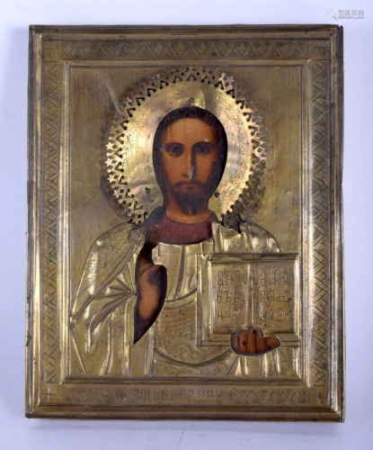 AN ANTIQUE RUSSIAN ICON mounted in yellow metal. 22 cm