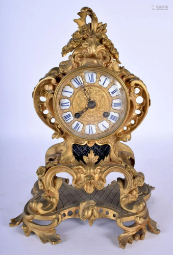 A 19TH CENTURY FRENCH ORMOLU SCROLLING MANTEL CLOCK
