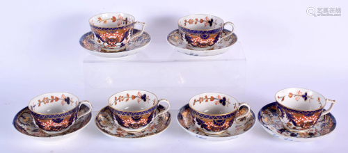SIX EARLY 19TH CENTURY DERBY IMARI CUPS AND SAUCERS.