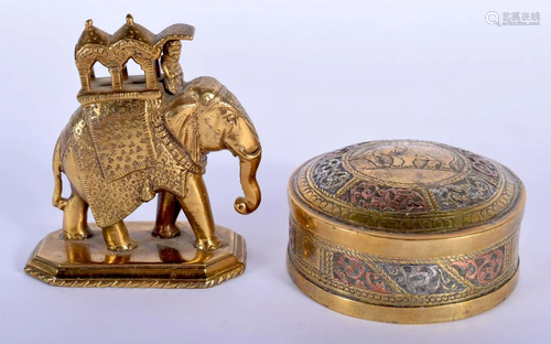 AN ANTIQUE INDIAN YELLOW METAL FIGURE OF AN ELEPHANT