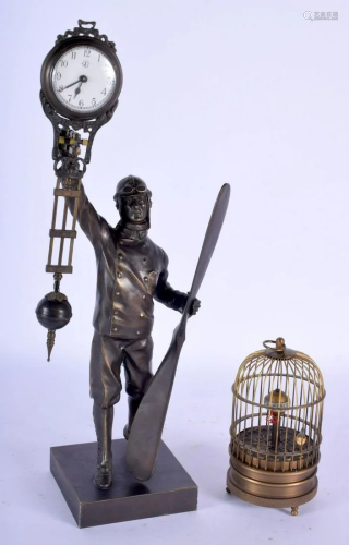 A CONTEMPORARY BRONZE RAF MYSTERY CLOCK together with a
