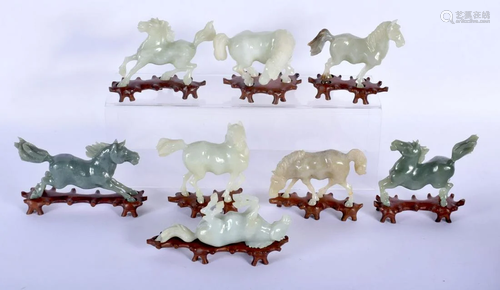 A SET OF EIGHT EARLY 20TH CENTURY CHINESE CARVED JADE