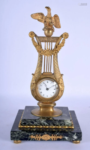 A MID 19TH CENTURY FRENCH EMPIRE STYLE BRONZE AND