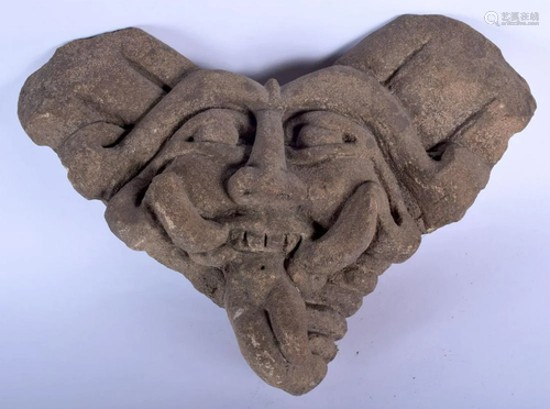 AN EARLY CARVED STONE AZTEC STYLE MASK HEAD. 26 cm x 16