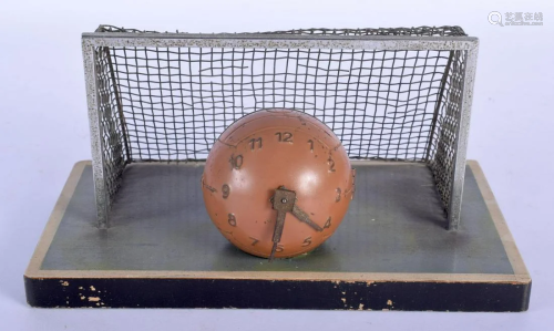 A VERY RARE 1950S PAINTED SPELTER FOOTBALL AND NET DESK