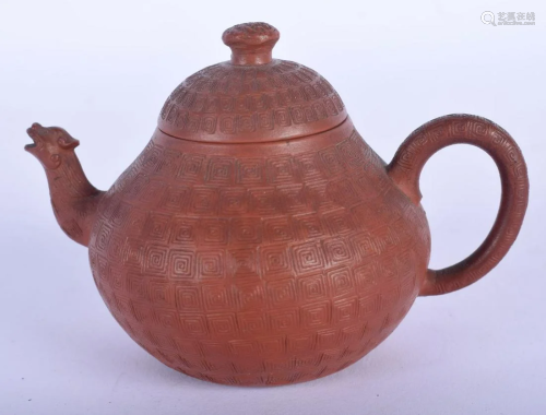 A CHINESE QING DYNASTY YIXING TEAPOT AND COVER After