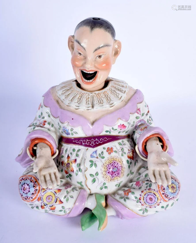 A 19TH CENTURY DRESDEN PORCELAIN NODDING FIGURE OF A