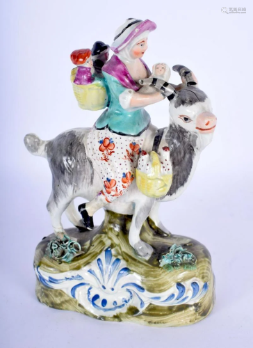 AN EARLY 19TH CENTURY ENGLISH PORCELAIN FIGURE OF THE