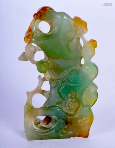 AN EARLY 20TH CENTURY CHINESE CARVED JADE FIGURE OF A