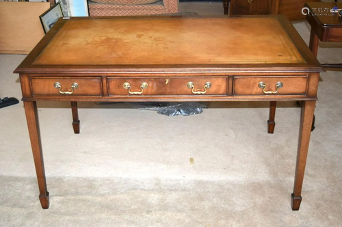 A REPRODUCTION THREE DRAWER LEATHER INSET DESK. 136 …