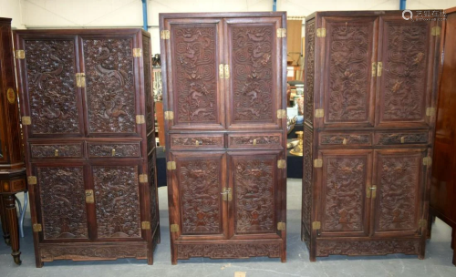 THREE EARLY 20TH CENTURY CHINESE CARVED HARDWOOD DRA…