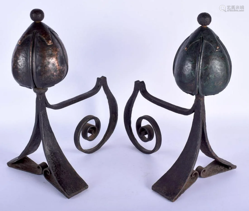 A STYLISH PAIR OF ART NOUVEAU COPPER AND WROUGHT…