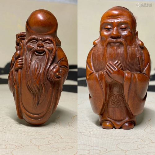 A pair of Chinese Boxwood carving figurines