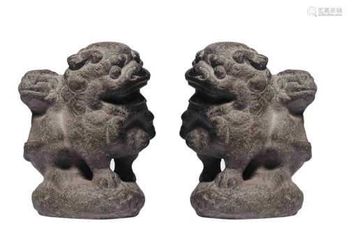 PAIR OF STONE 'LION' CARVINGS